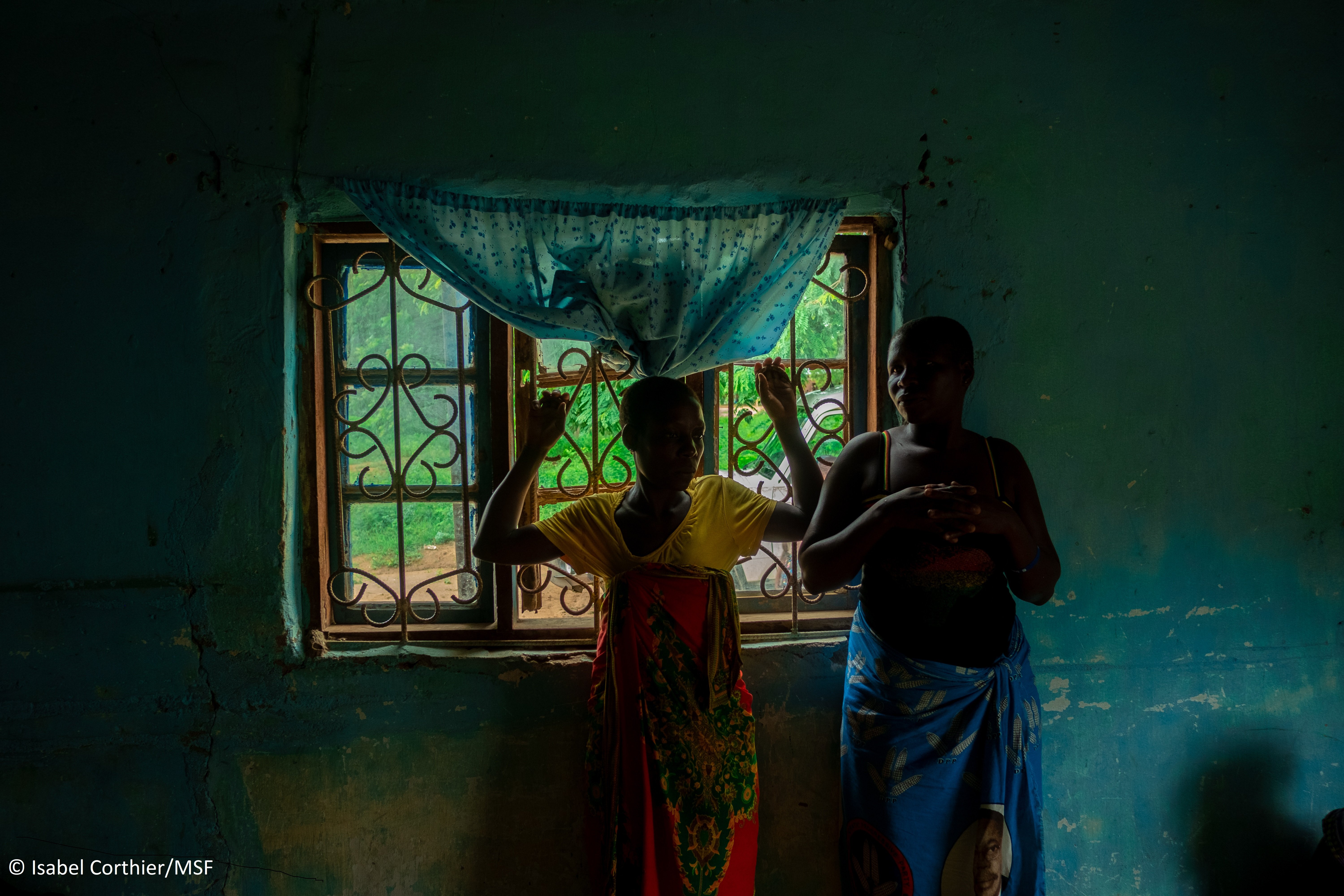 Sex workers during an outreach clinic conducted by MSF's sex worker project in a rented room in Nsanje, Malawi. Photo by Isabel Corthier/MSF.
