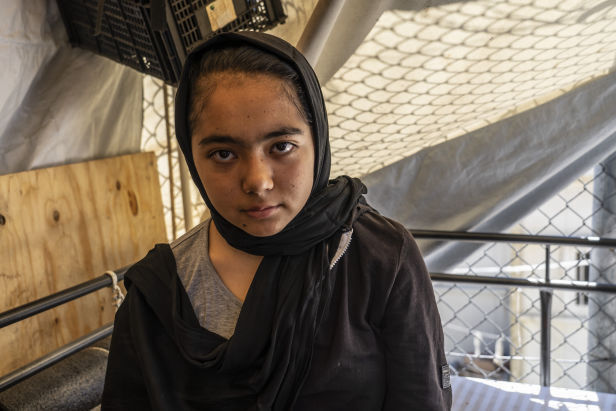 Zeynab, a 12-year-old refugee suffering from brain tumor and frequent epileptic crises. Moria Camp, Greece. Photo by Anna Pantelia.