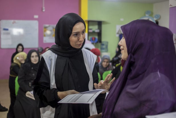 Wafaa, Midwives Supervisor at MSF’s clinic in Bourj El Barajneh camp is receiving Jehan, a 30 year old mother in her 5th month of pregnancy. Photo by Severine Sajous.